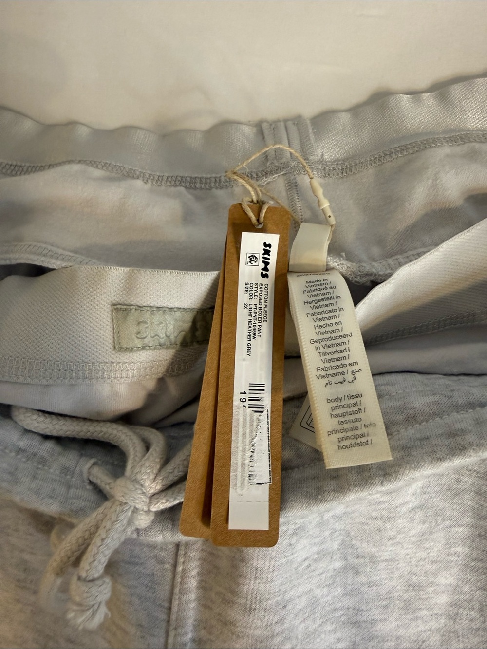 SKIMS Cotton Fleece Exposed Boxer Pants in "Light Heather Grey 2X Flawed